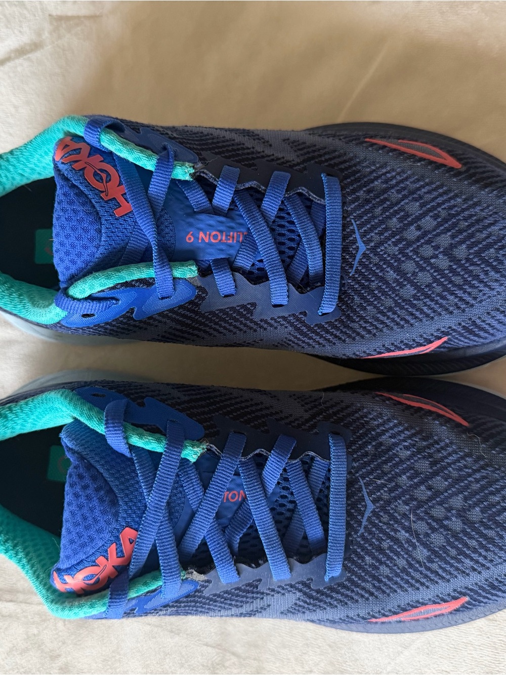 Hoka One One Women's Blue Running Shoes with Teal and Coral Highlights